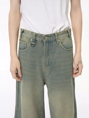 Wide leg jeans in air force blue cotton blend with button fly and distressed wash.
