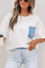 White cotton tee with denim pocket, crew neck, short sleeves, relaxed fit.