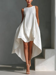 Elegant white high-low hem sleeveless dress with asymmetrical hemline.