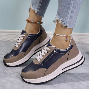 Zipper detail lace up sneakers in navy and taupe with a chunky sole.