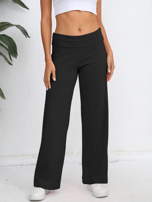 Black palazzo trousers with fold-over waistband, wide leg, and full length.