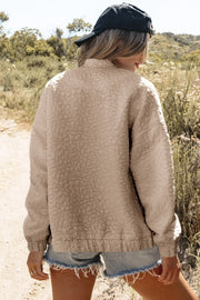Dust Storm bomber jacket with all-over floral texture and ribbed cuffs.