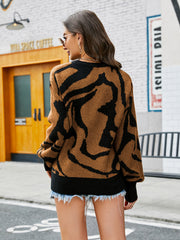 Tiger stripe knit crewneck sweater in caramel with black pattern, acrylic, crew neck, long sleeves.
