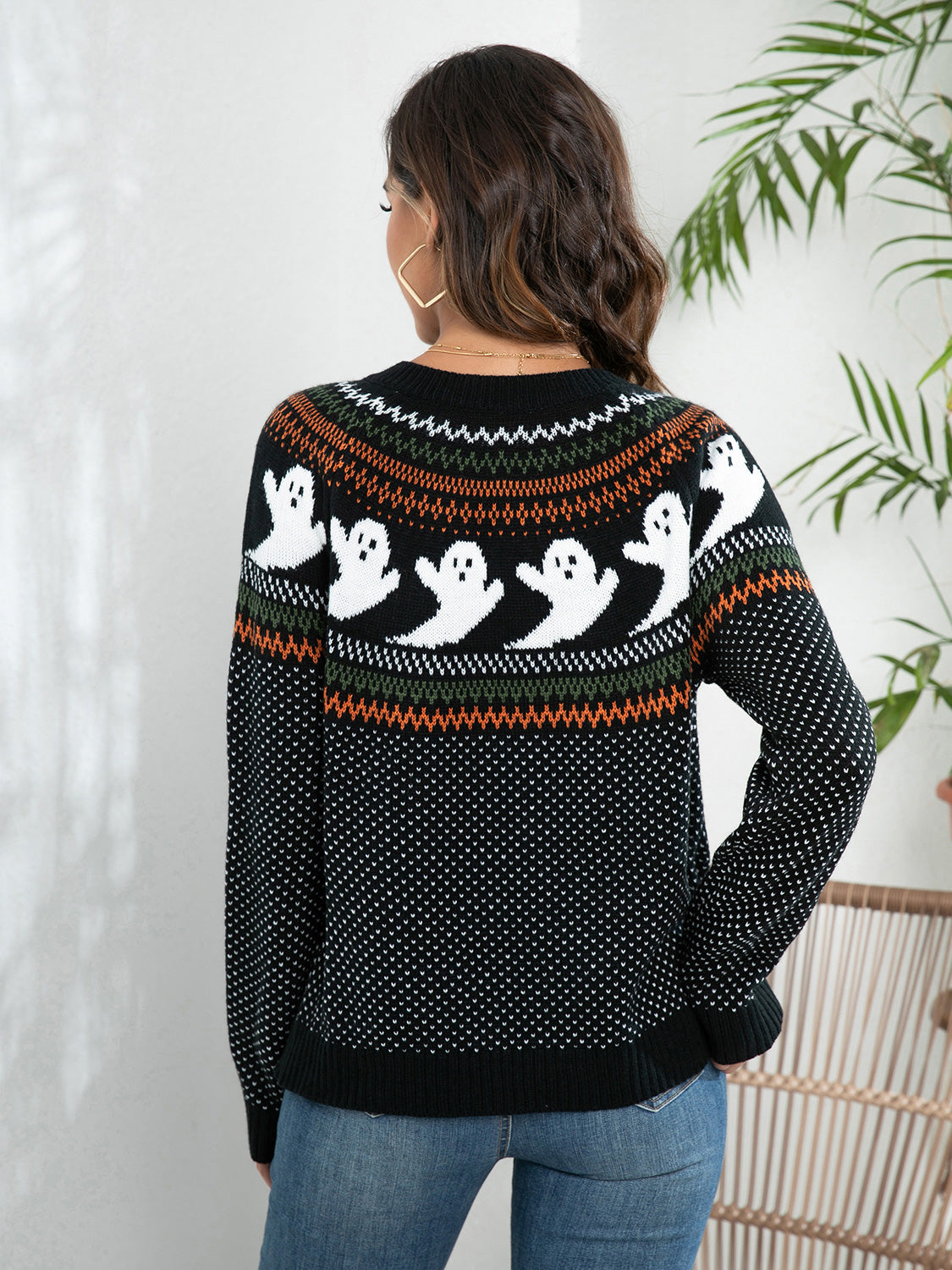 Black acrylic Fair Isle knit sweater with ghost pattern and crew neck.