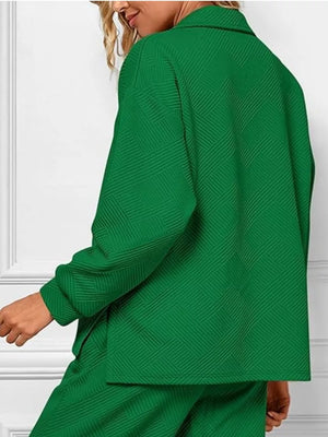 Green textured two-piece lounge set with diagonal pattern and V-neck top.