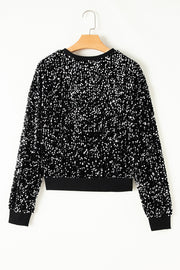 Black sequin embellished sweatshirt with ribbed cuffs and hem