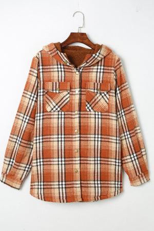 Sherpa-lined plaid overshirt jacket in tangerine with button front and chest pockets.
