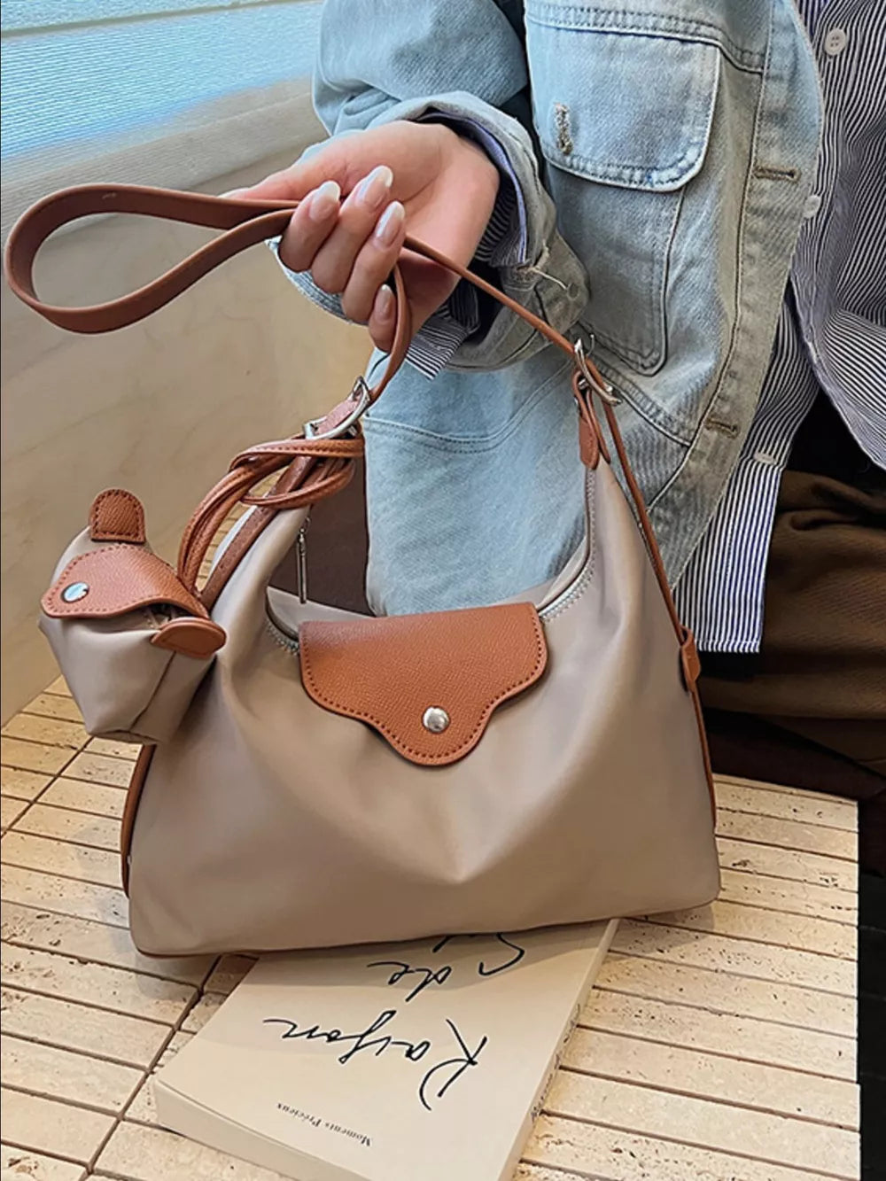 Elevated canvas hobo bag in Khaki with brown trim and coin purse.