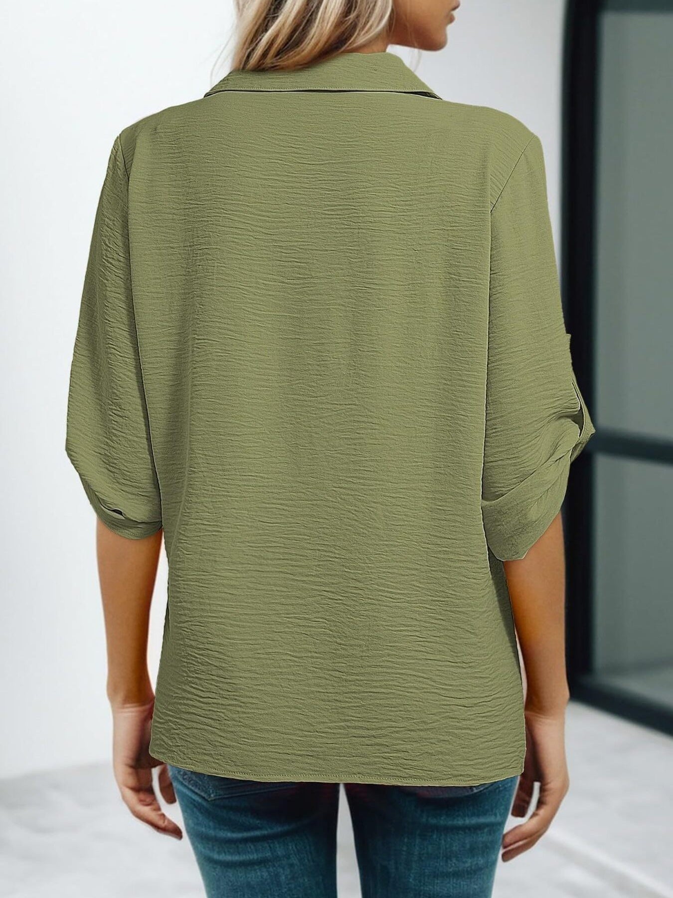 Army green crinkled texture Johnny collar shirt with rolled sleeves.