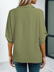 Army green crinkled texture Johnny collar shirt with rolled sleeves.