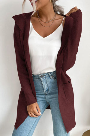 Burgundy ribbed knit hooded cardigan with drape front and pockets.