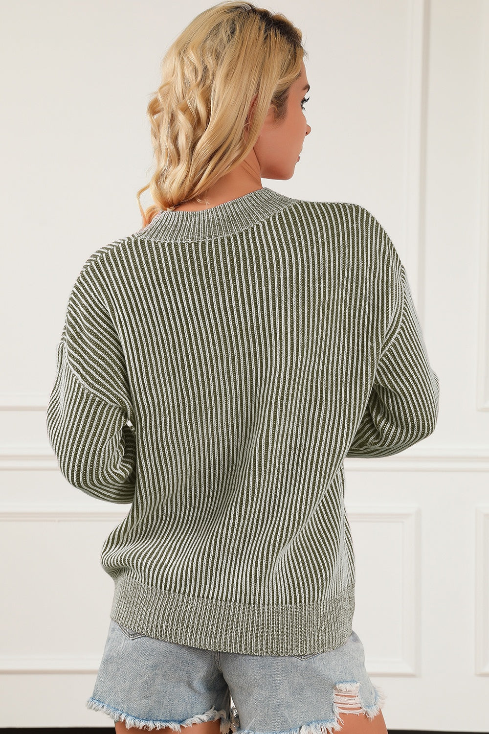 Vertical ribbed mock neck pullover in sage with white stripes, acrylic knit, long sleeves.