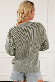 Vertical ribbed mock neck pullover in sage with white stripes, acrylic knit, long sleeves.