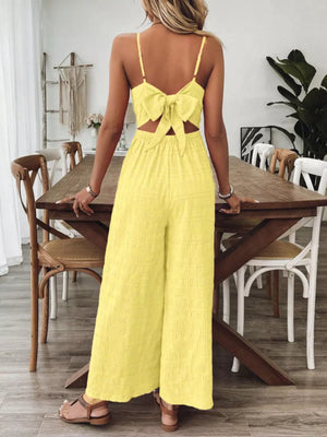 Yellow maternity romper with back bow detail and wide legs