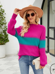 Colorblock ribbed sweater in hot pink and teal with crew neck and long sleeves.