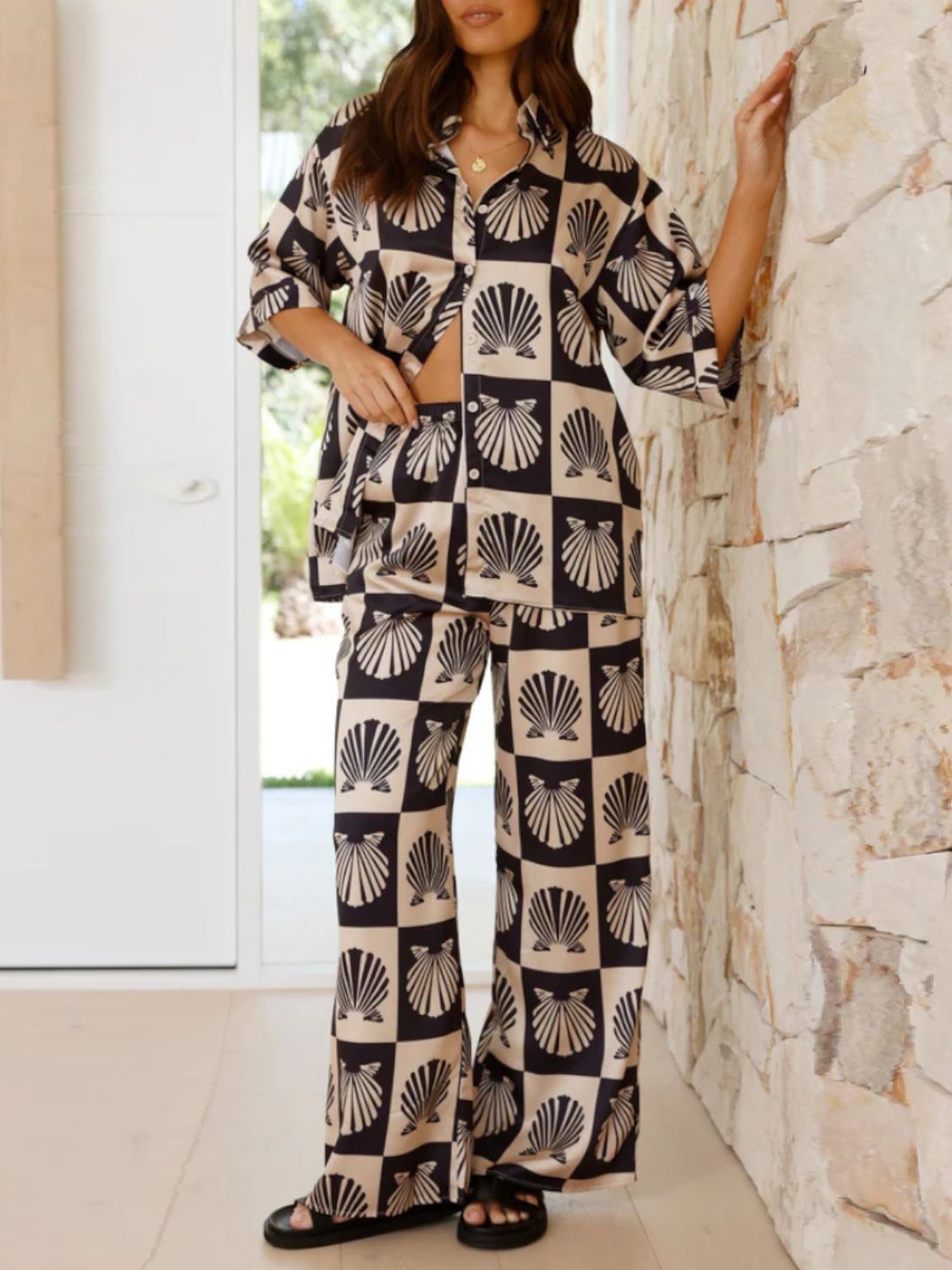 Black silk pajama set with shell print and buttoned top