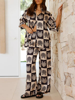 Black silk pajama set with shell print and buttoned top