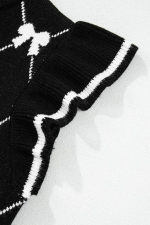 Black knit vest with white diamond bow pattern and striped trim