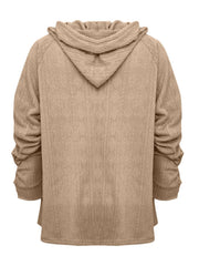 Textured knit raglan hoodie in camel with diamond pattern and ruched sleeves.