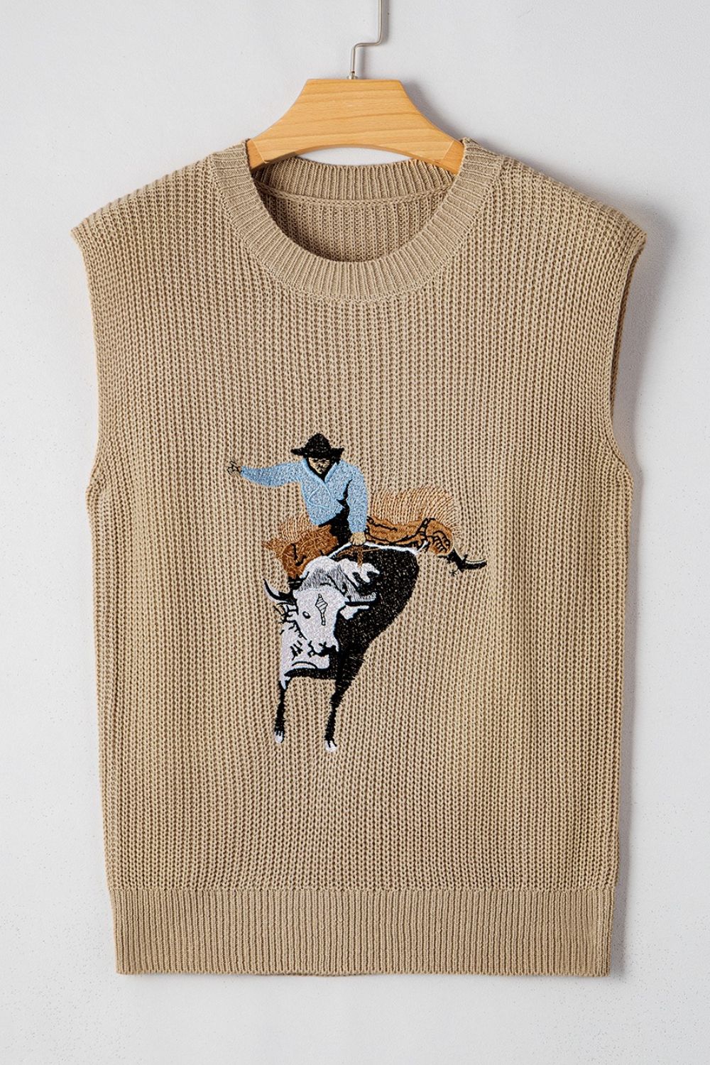 Tan knit tank top with cowboy riding a bull graphic, acrylic, crew neck, sleeveless.