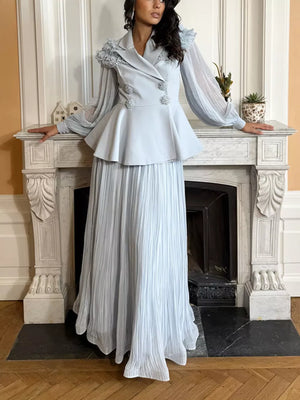 Light blue frill collar two-piece skirt suit with balloon sleeves and pleated maxi skirt.