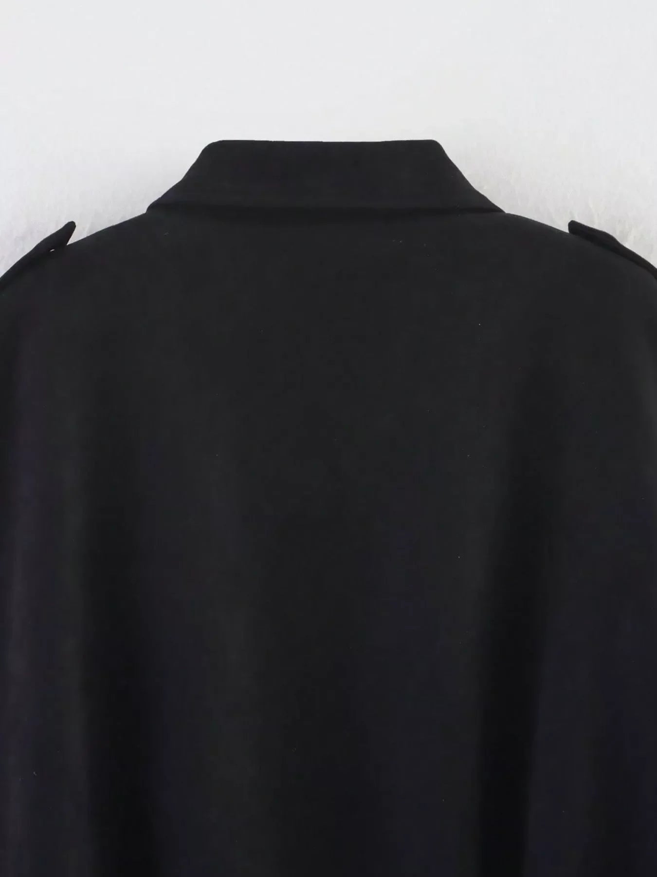 Black oversized zip-up jacket with epaulets and collar detail