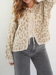 Khaki leopard print tie-front cropped cardigan with long sleeves.
