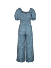 Smocked bodice floral wide-leg jumpsuit in Dusty Blue with puff sleeves and square neckline.