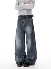 Men's dark wash wide-leg jeans with a belted waist and vintage-inspired details.