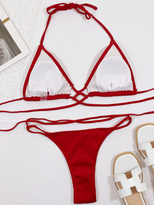 Burgundy ribbed halter bikini set with crisscross detail and thong bottoms.