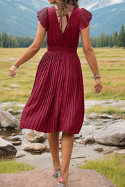 Deep Red pleated midi dress with flutter sleeves and smocked waist.