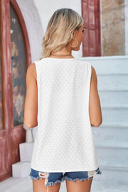 White eyelet vest with pockets, sleeveless, round neck, casual drape front style