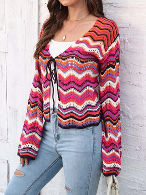 Chevron knit tie-front cardigan with colorful zig-zag pattern and open knit details.