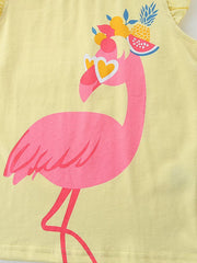 Yellow cotton baby top with a pink flamingo graphic wearing heart sunglasses and fruit hat.