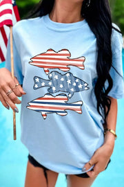Light blue t-shirt with patriotic fish graphic featuring red, white, and blue stripes and stars.