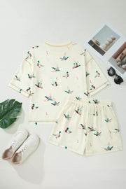 Beige mallard duck print pajama set with crew neck top and drawstring shorts.