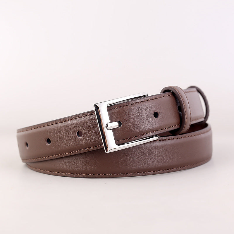 Brown leather skinny belt with silver buckle and stitched detail.