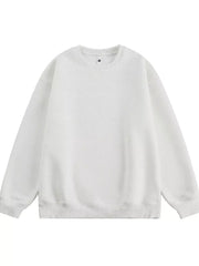 Oversized crew-neck sweatshirt in white, featuring a relaxed fit and ribbed cuffs and hem.