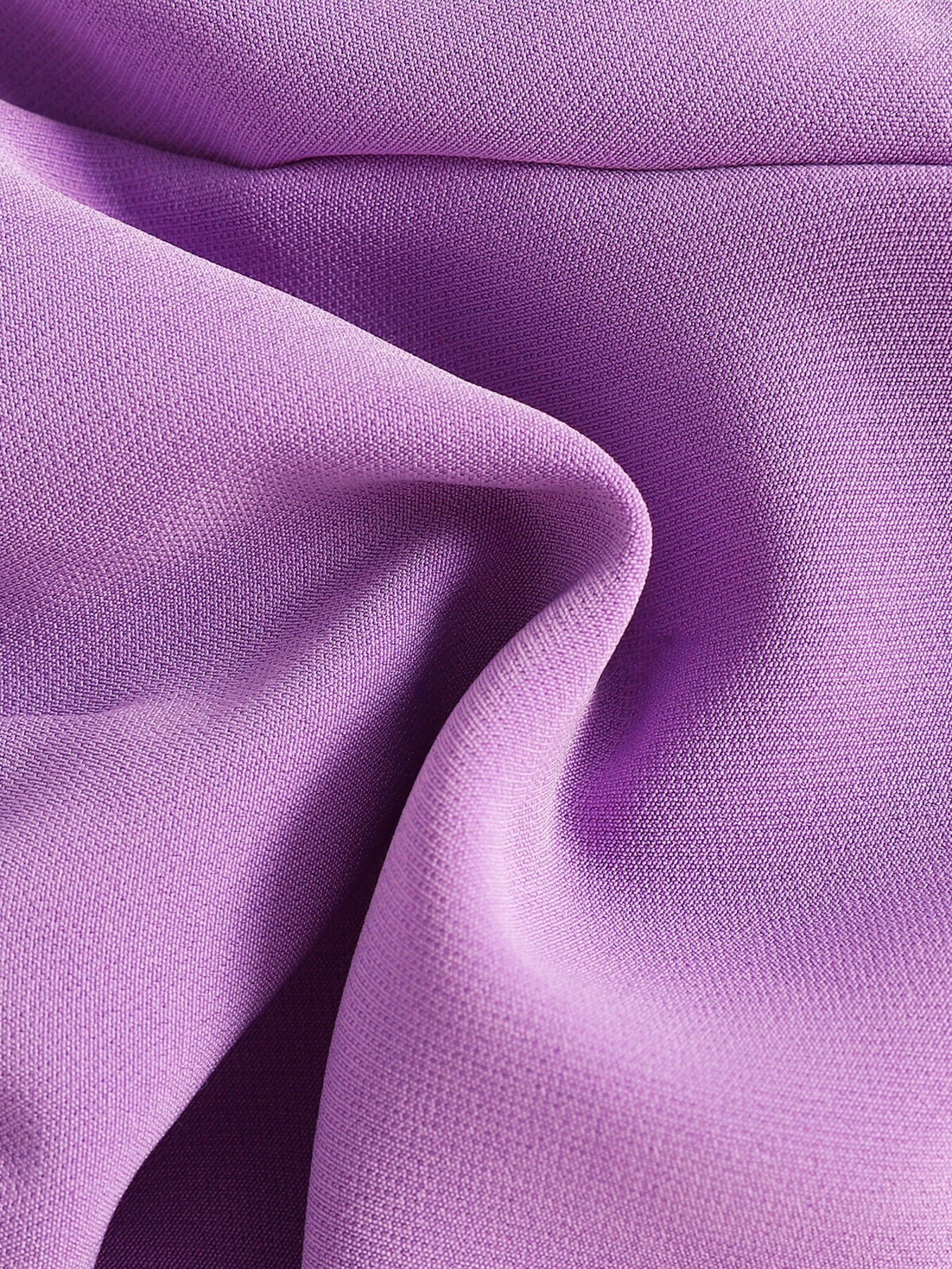 Purple cotton baby set fabric detail with subtle texture