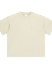 Oversized washed cotton crewneck t-shirt in beige with a relaxed fit and crew neckline.