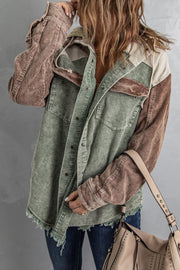 Colorblock corduroy hooded utility jacket in green and tan with frayed hem and distressed details.