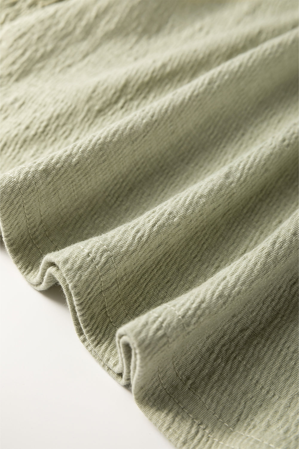 Sage textured puff sleeve blouse with elastic cuffs detail