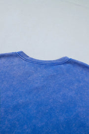 Blue cotton t-shirt with washed effect and notched neckline detail