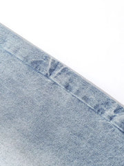 Light blue denim capris for men, relaxed fit, cotton fabric detail.