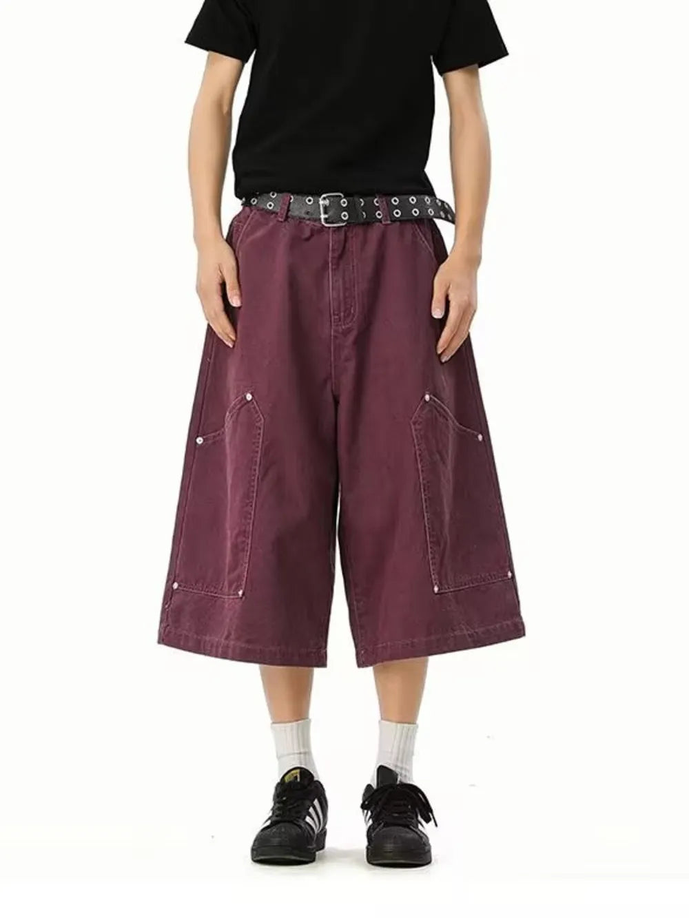 Relaxed fit purple cargo shorts with utility pockets and white stitching.