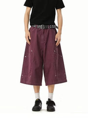 Relaxed fit purple cargo shorts with utility pockets and white stitching.