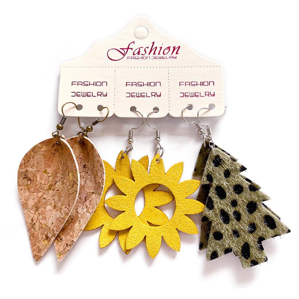 Leopard print tree, yellow sunflower, and cork leaf dangle earrings.