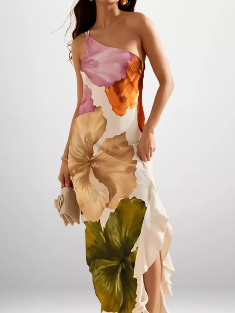 Elegant floral one-shoulder maxi dress in polyester with ruffled hem and large botanical print.