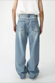 Painted Script baggy jeans in medium wash denim with a relaxed fit.