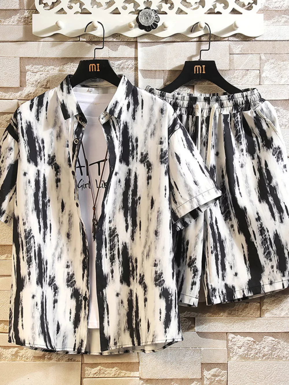 Men's abstract print short-sleeve shirt and shorts set in black and white.